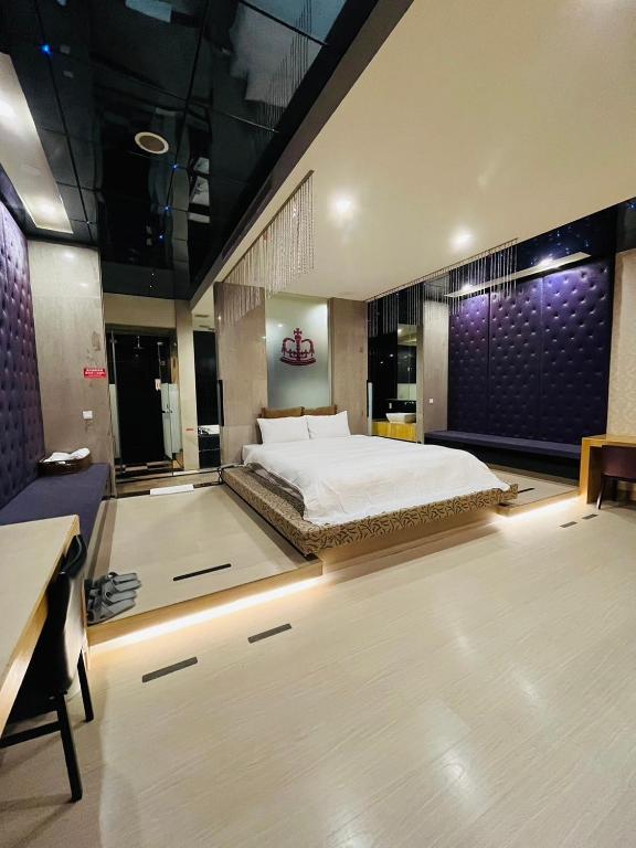 Postel nebo postele na pokoji v ubytování Walker Hotel - Chengde