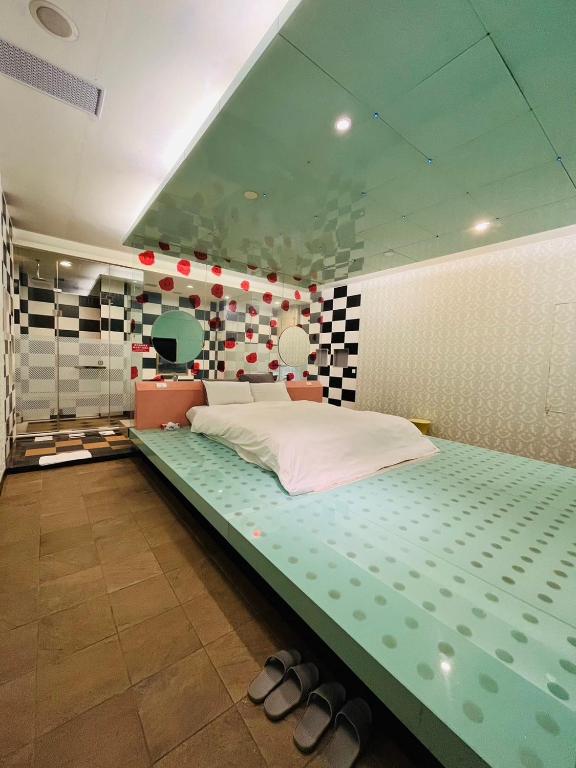 Postel nebo postele na pokoji v ubytování Walker Hotel - Chengde