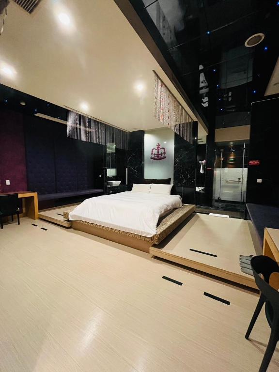Postel nebo postele na pokoji v ubytování Walker Hotel - Chengde