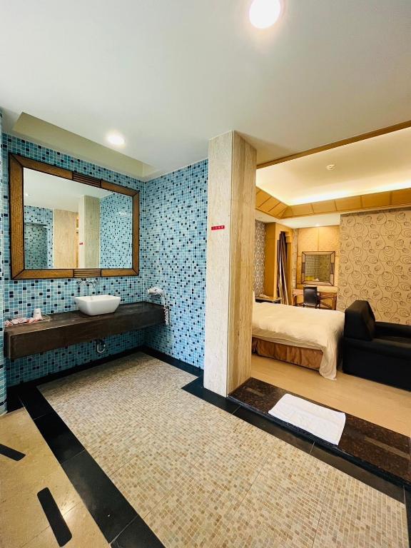 Postel nebo postele na pokoji v ubytování Walker Hotel - Chengde
