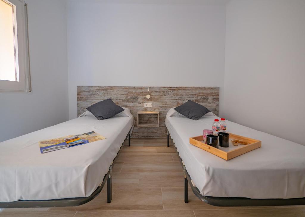 Postel nebo postele na pokoji v ubytování Agi Gloria Rooms