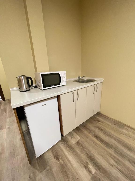Kuchyň nebo kuchyňský kout v ubytování Pierre Apartments