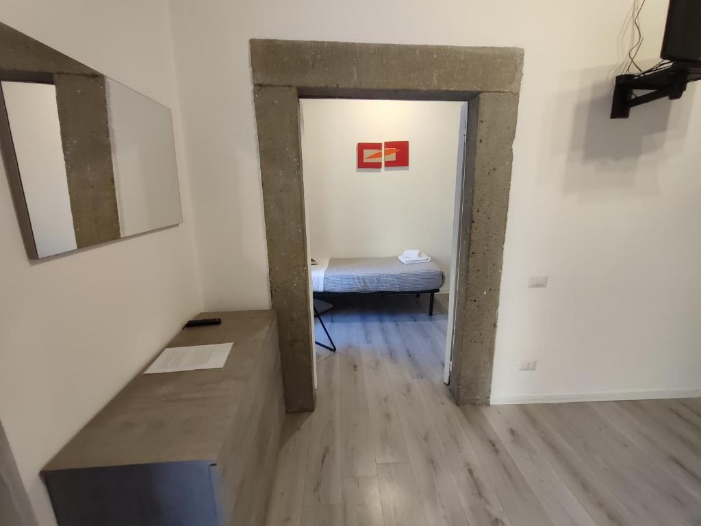 Łóżko lub łóżka w pokoju w obiekcie Giubbonari Street