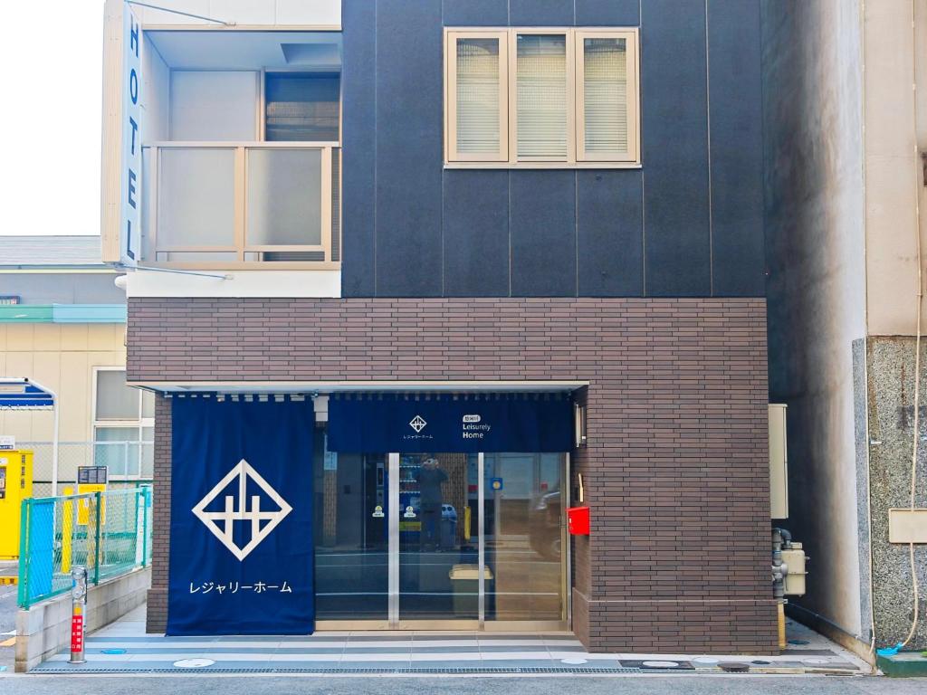 Muka bangunan atau pintu masuk Leisurely Home · Namba 悠闲居·难波