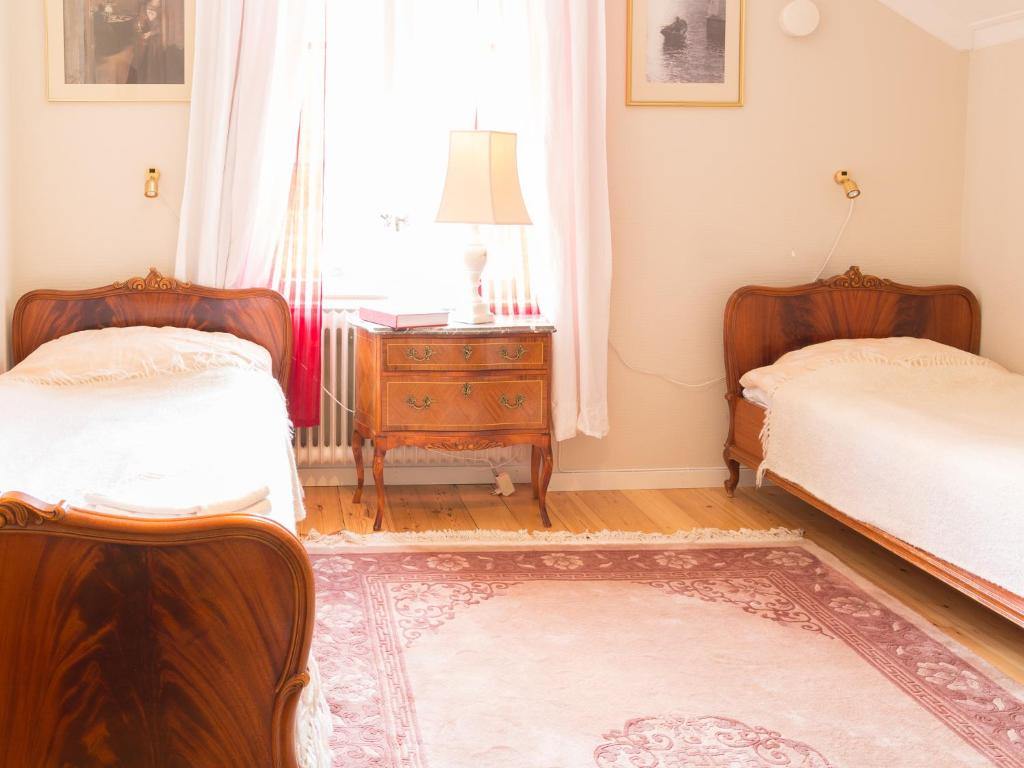 Postel nebo postele na pokoji v ubytování Varmland Hotel