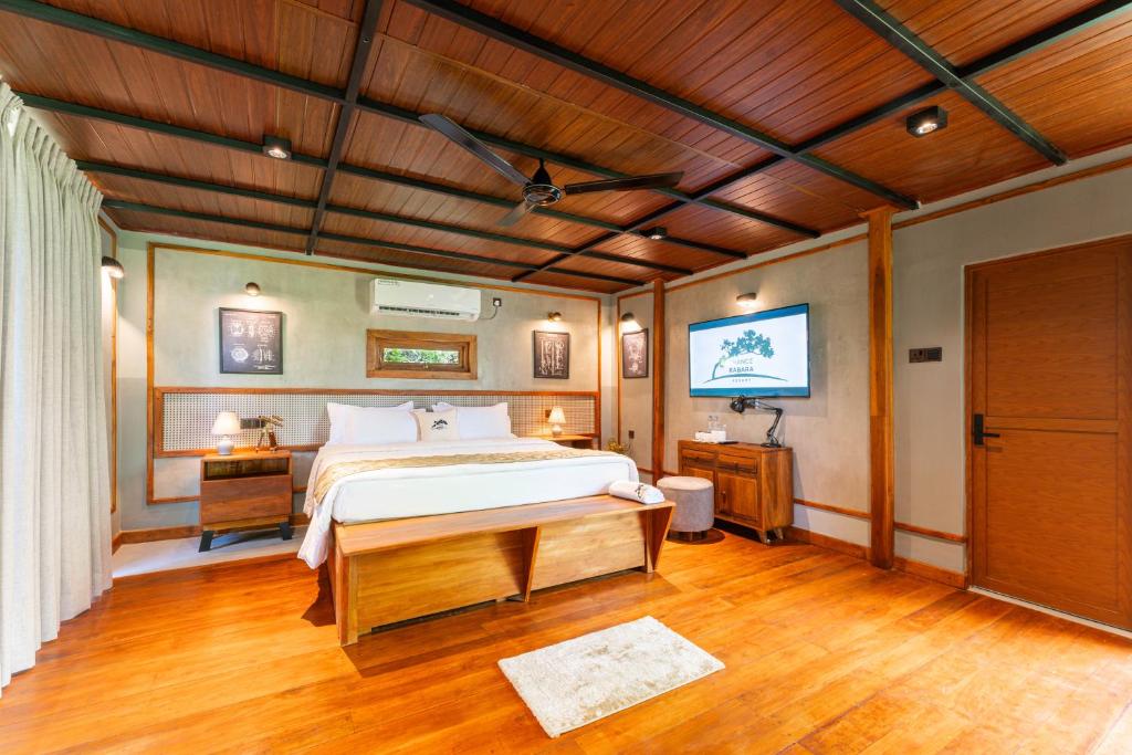 Postel nebo postele na pokoji v ubytování Trance rabara resort