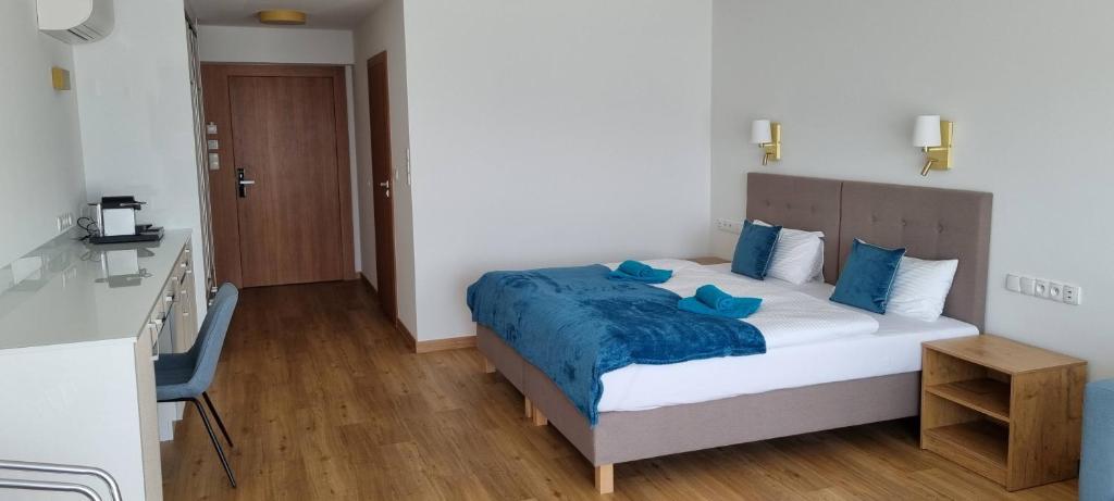 Postel nebo postele na pokoji v ubytování Villa Le Lux