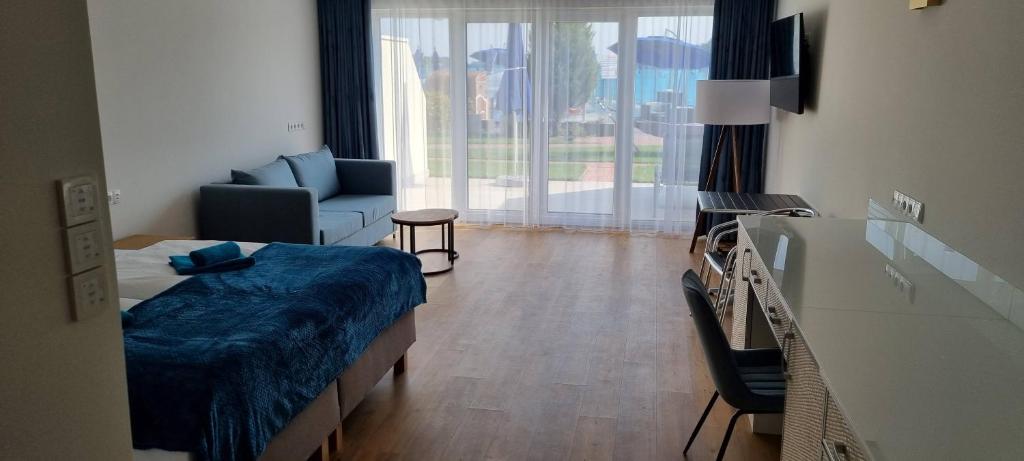 TV a/nebo společenská místnost v ubytování Villa Le Lux