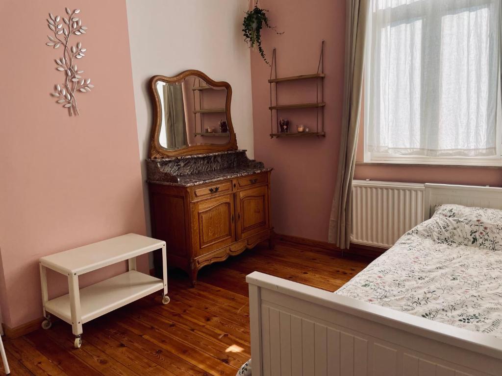 Postel nebo postele na pokoji v ubytování Les Volets Blancs