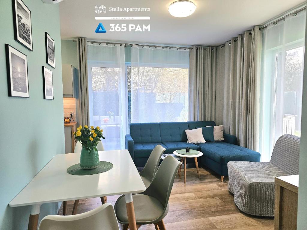 Et opholdsområde på Przytulny Apartament z Ogrodem - 365PAM