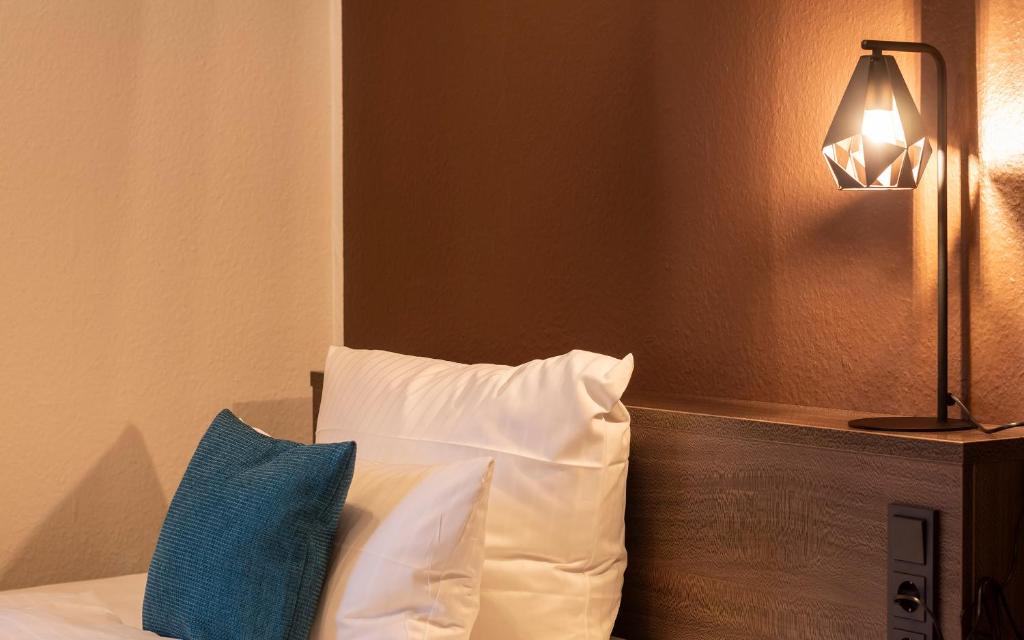 Postel nebo postele na pokoji v ubytování Trip Inn Hotel Sachsenhausen