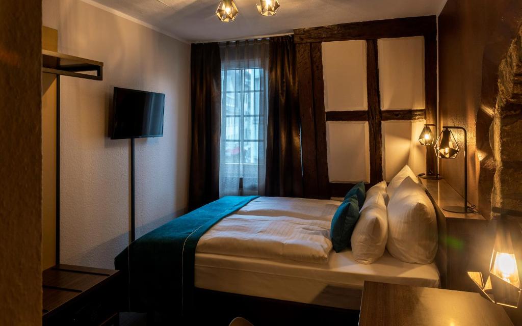 Postel nebo postele na pokoji v ubytování Trip Inn Hotel Sachsenhausen