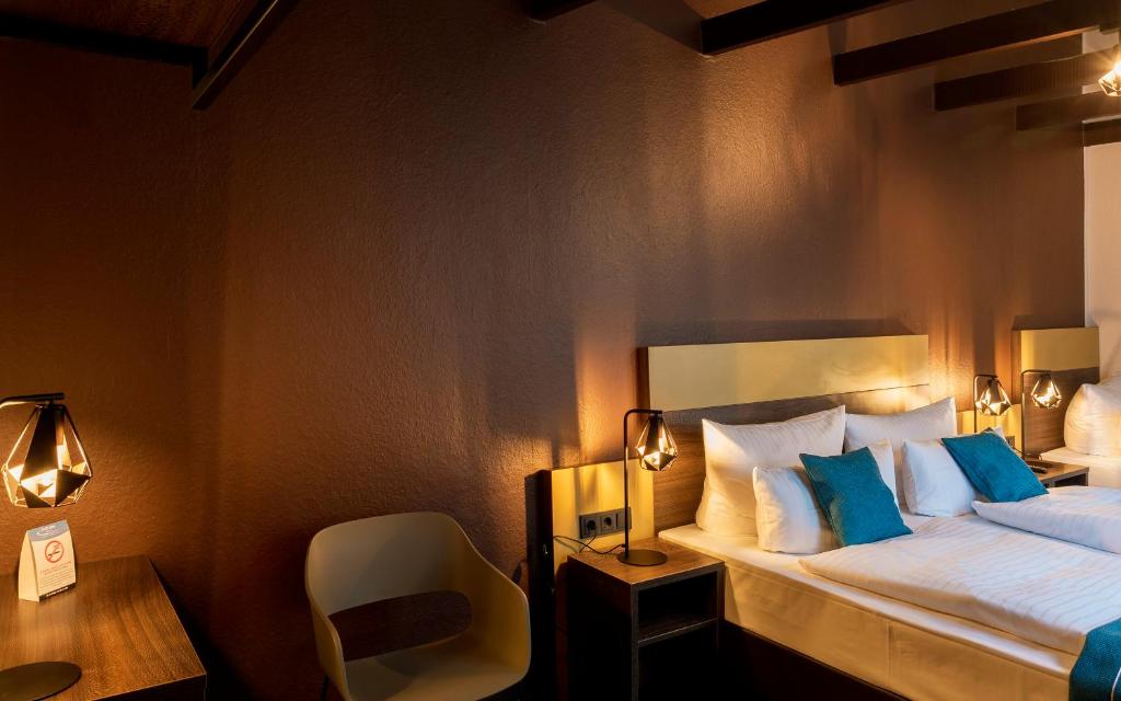 Postel nebo postele na pokoji v ubytování Trip Inn Hotel Sachsenhausen