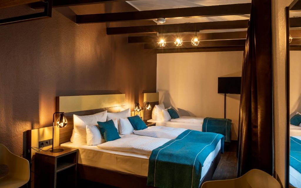 Postel nebo postele na pokoji v ubytování Trip Inn Hotel Sachsenhausen