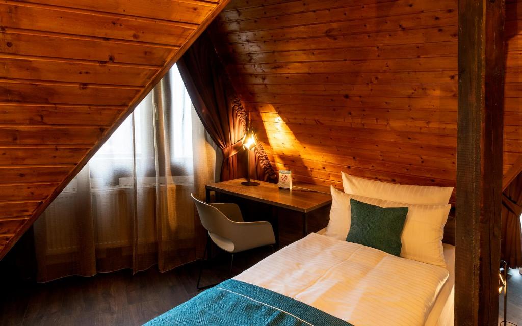 Postel nebo postele na pokoji v ubytování Trip Inn Hotel Sachsenhausen