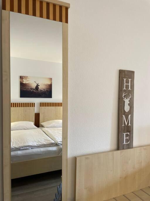 Ein Bett oder Betten in einem Zimmer der Unterkunft Auszeit genießen - mit Gang zur Wohlfühltherme