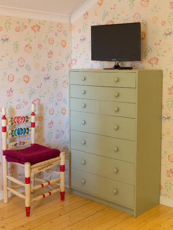 TV a/nebo společenská místnost v ubytování Varmland Hotel