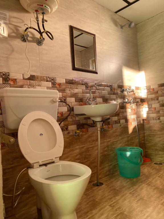 Koupelna v ubytování Jagatram Niwas Guesthouse Dharamkot
