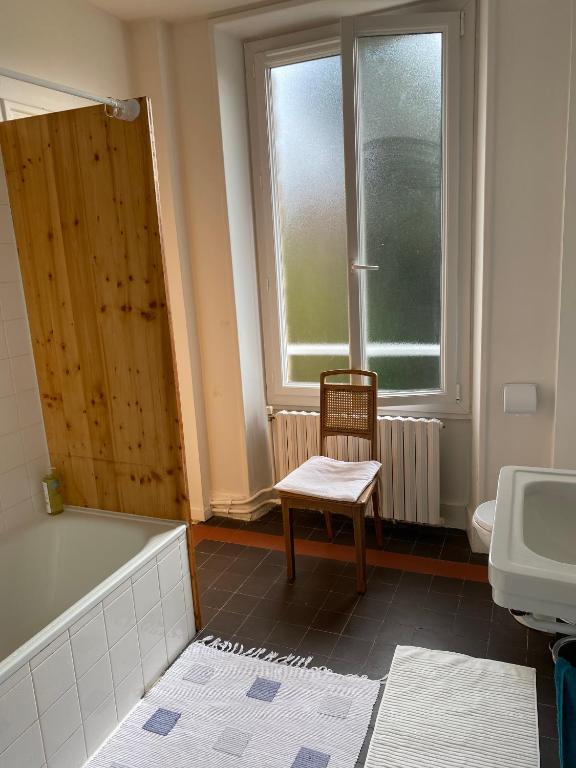Postel nebo postele na pokoji v ubytování AQUARELLE