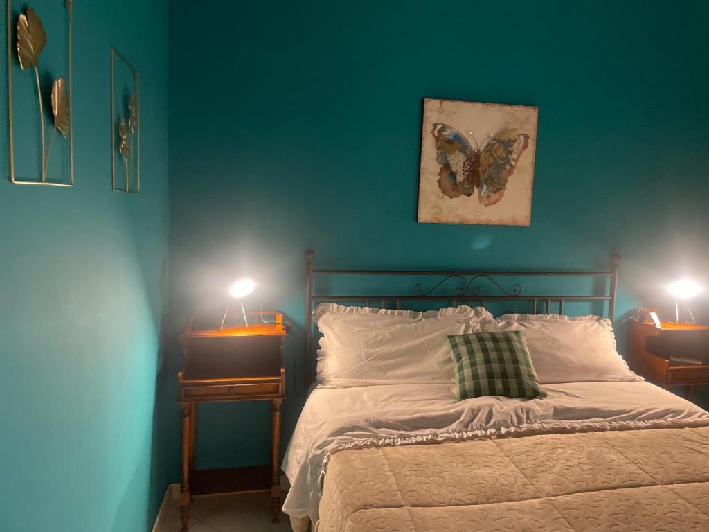 Postel nebo postele na pokoji v ubytování Pompei Home Apartament