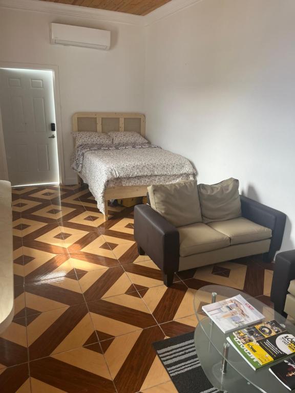 Postelja oz. postelje v sobi nastanitve SanAndros Airbnb