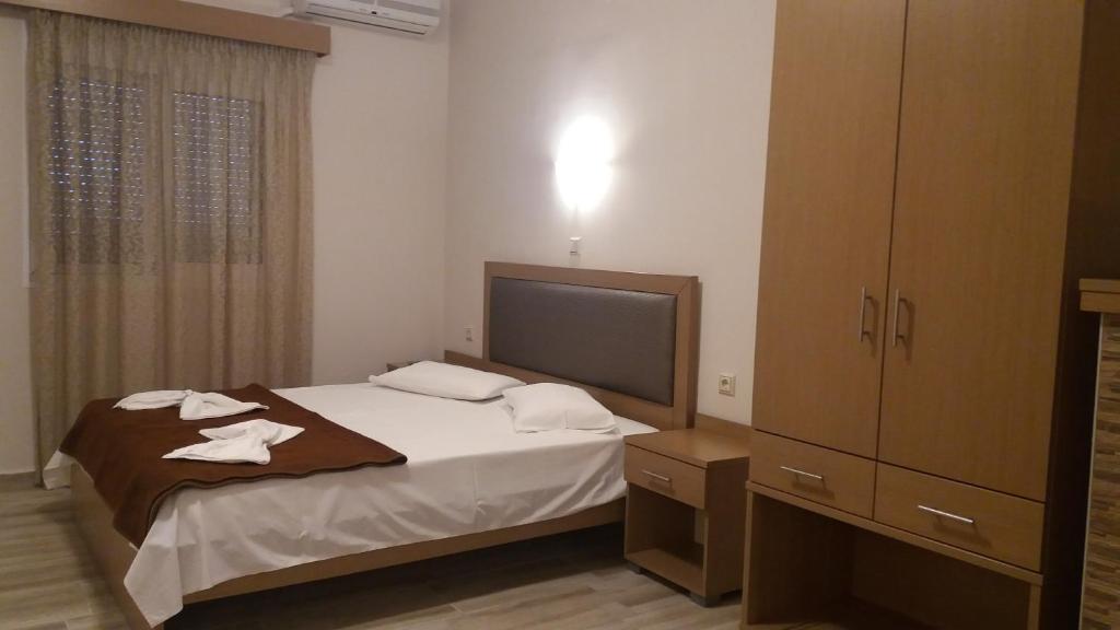 Postel nebo postele na pokoji v ubytování VILLA ANESTIS