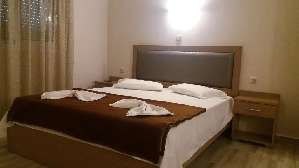 Postel nebo postele na pokoji v ubytování VILLA ANESTIS