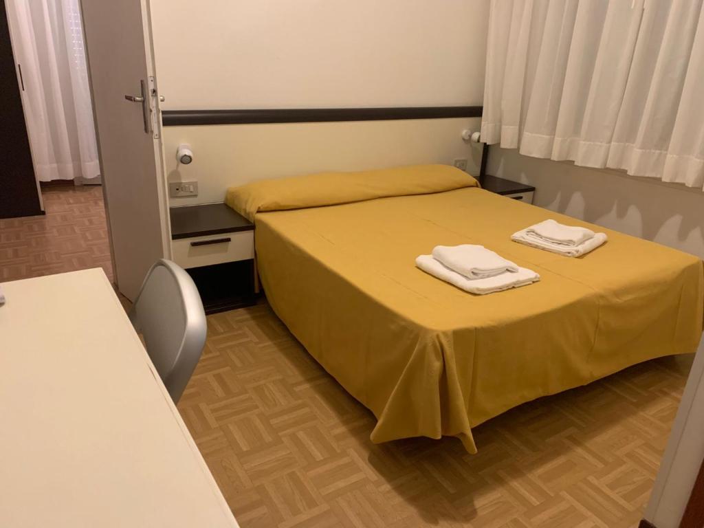 Postel nebo postele na pokoji v ubytování Hotel Aspe