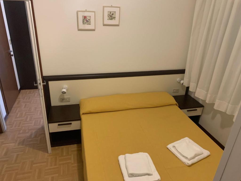 Postel nebo postele na pokoji v ubytování Hotel Aspe