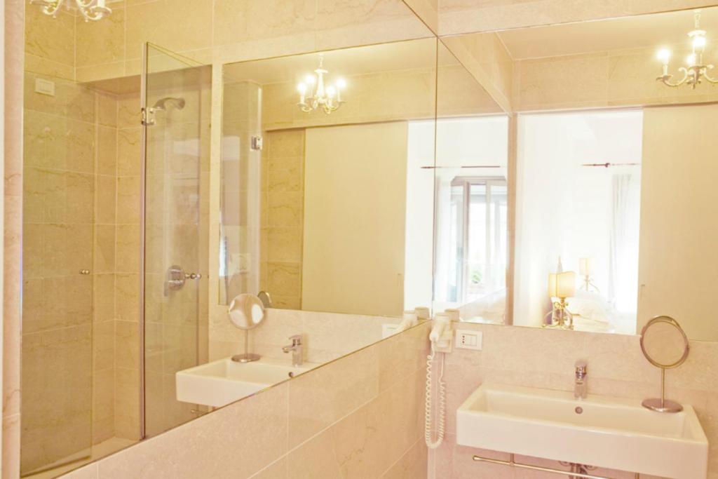 A bathroom at Milano Suites