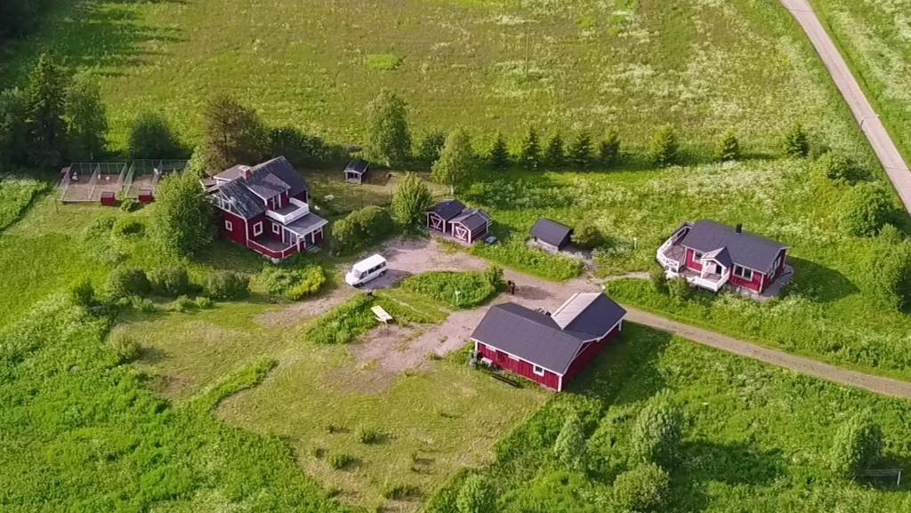 an aerial view of a house and a yard at Sam Arctic in Övertorneå