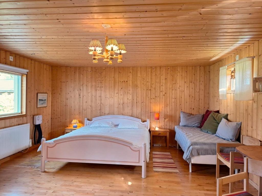 Postel nebo postele na pokoji v ubytování Sam Arctic