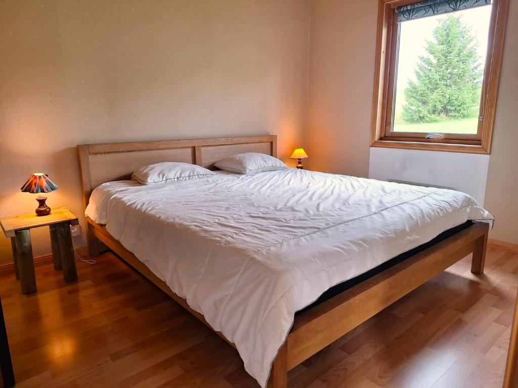 Postel nebo postele na pokoji v ubytování Sam Arctic