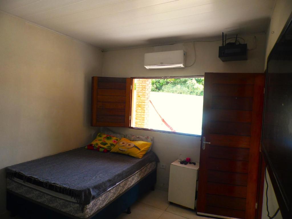 Postel nebo postele na pokoji v ubytování Bitingui Infinity