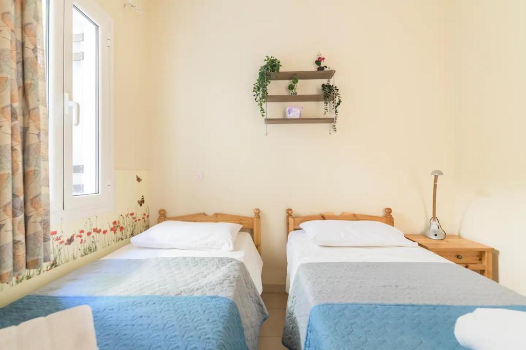 Posteľ alebo postele v izbe v ubytovaní Family Seaview Balconies Hilda Home 90