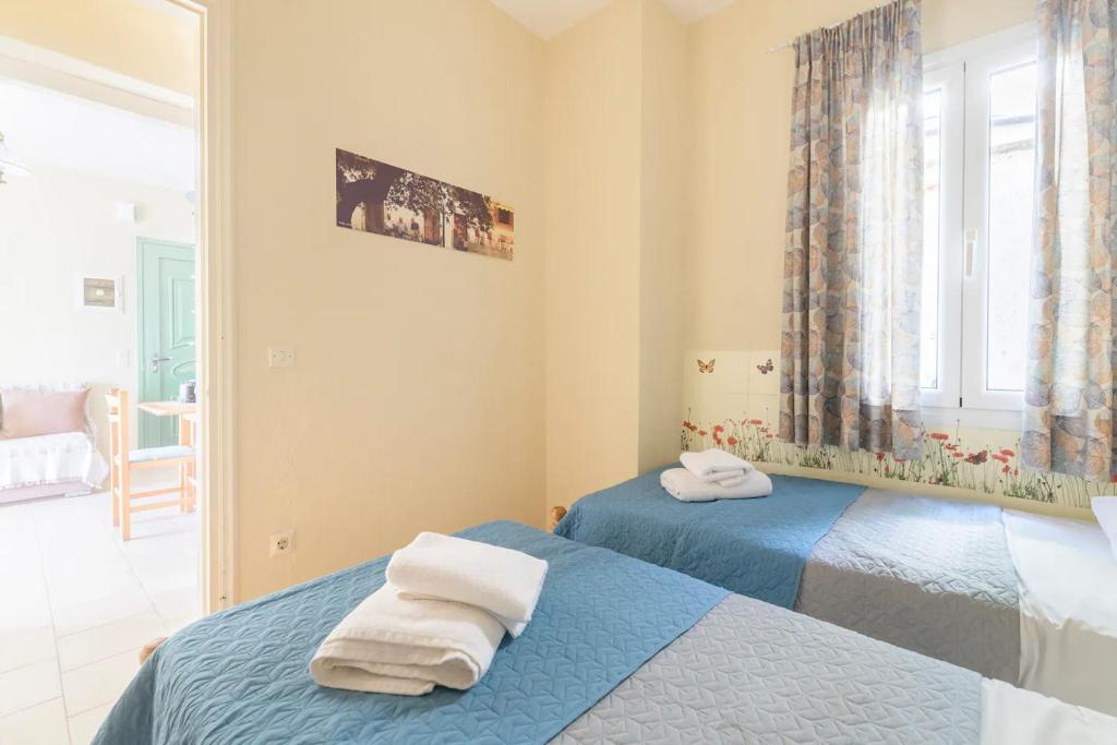 Posteľ alebo postele v izbe v ubytovaní Family Seaview Balconies Hilda Home 90