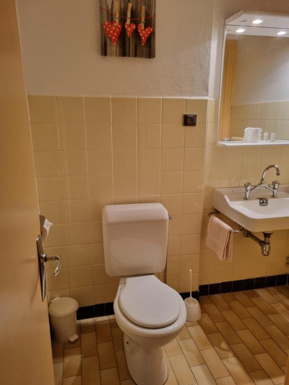 Koupelna v ubytování Hotel Bellevue