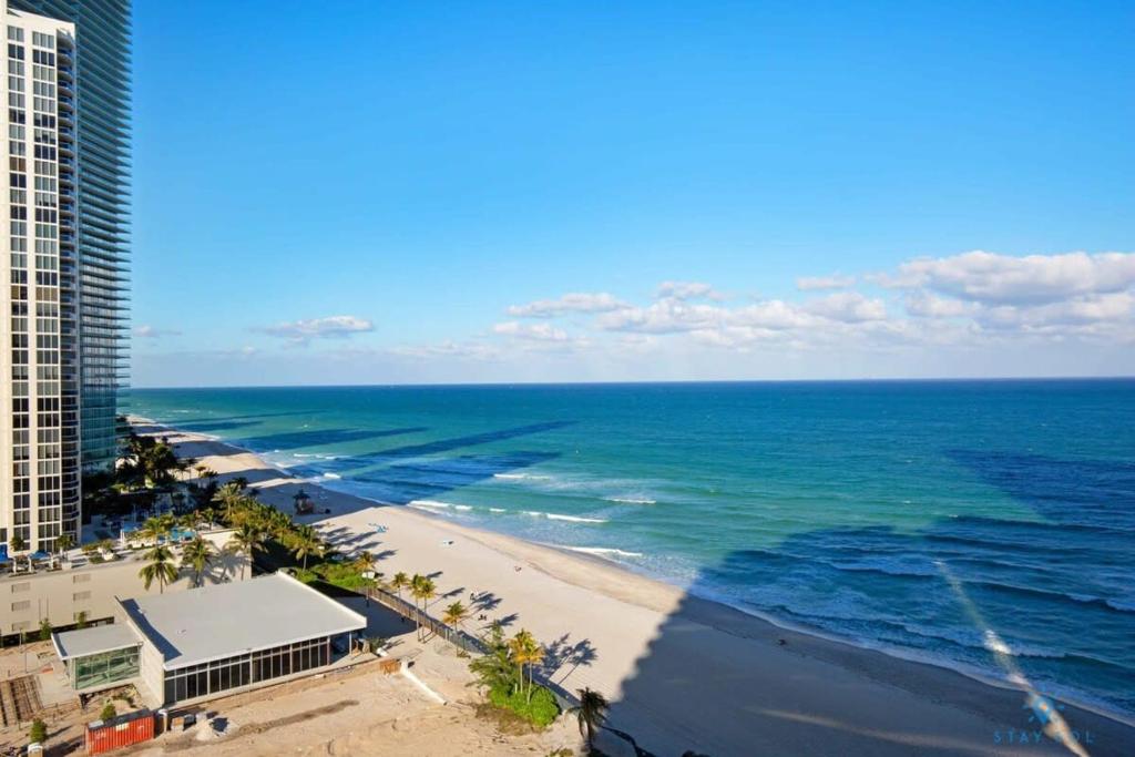 an aerial view of the beach and the ocean at New Sunny Isles: Oceanview Comfort Stay in Aventura