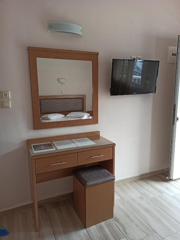 TV a/nebo společenská místnost v ubytování VILLA ANESTIS