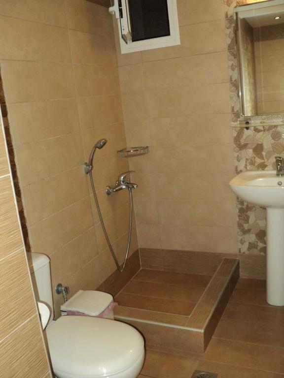 Koupelna v ubytování VILLA ANESTIS
