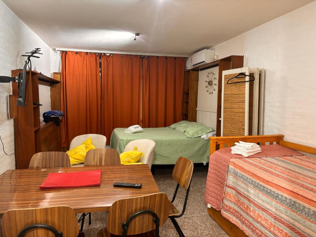 מיטה או מיטות בחדר ב-Spiaggia 218