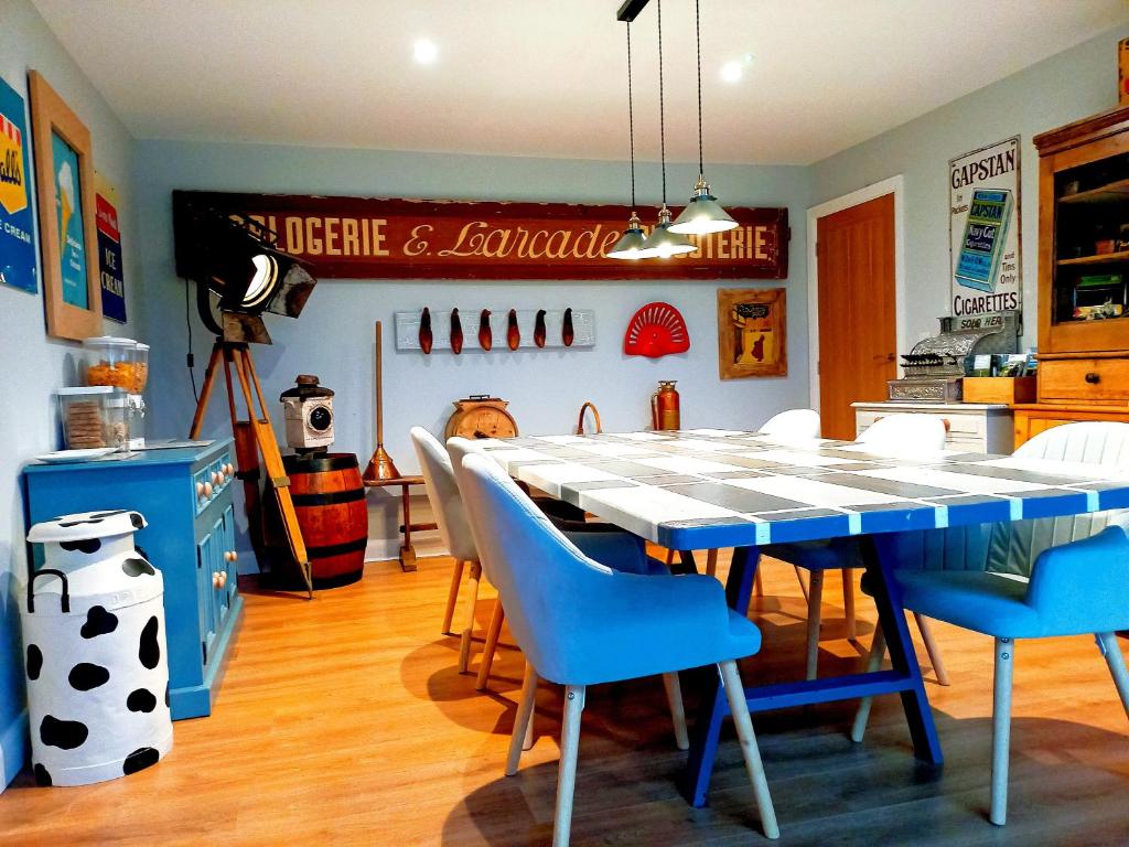 a dining room with a table and some chairs at Englefield Guesthouse in Goathland