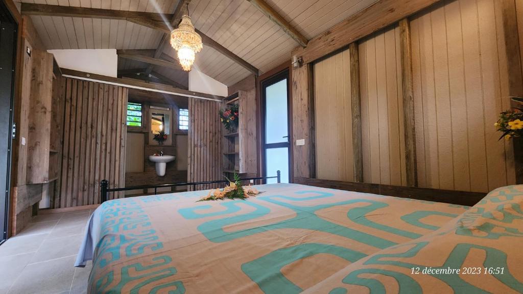 Letto o letti in una camera di Residence Vainau Moorea