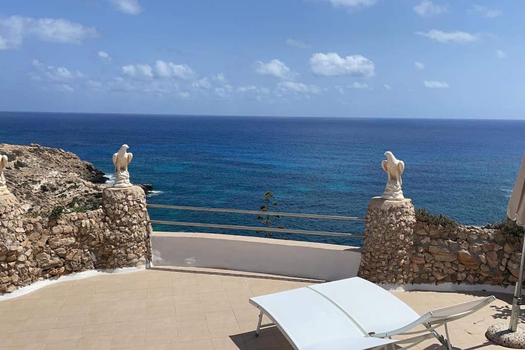 a balcony with a view of the ocean at Villa a picco sul mare - Cala Creta in Lampedusa