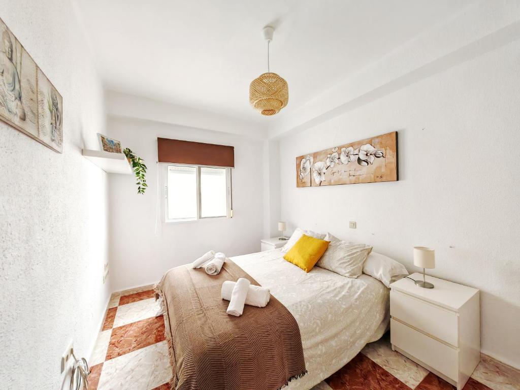 Posteľ alebo postele v izbe v ubytovaní Gran apartamento en el Centro Histórico