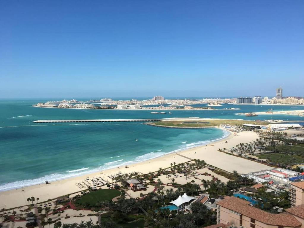 an aerial view of a beach and the ocean at Frank Porter - Sadaf 6 in Dubai