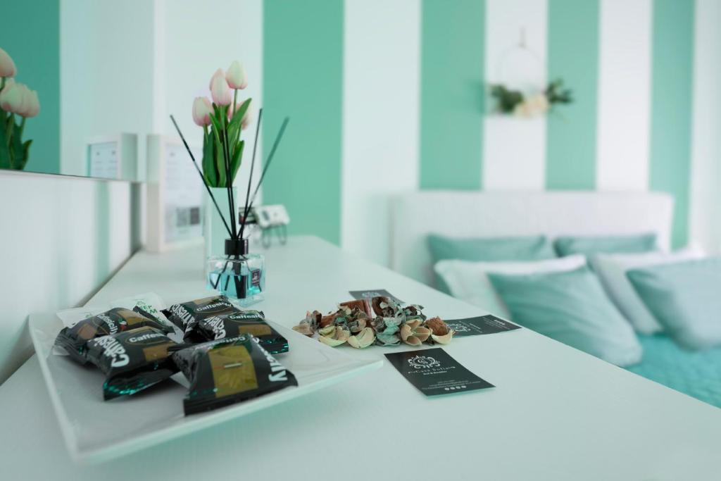 Łóżko lub łóżka w pokoju w obiekcie Casa Sofia