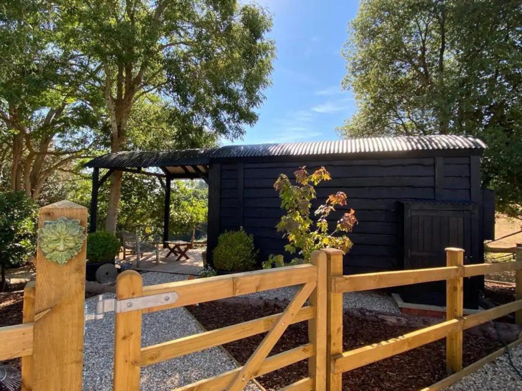 Zahrada ubytování The Woodmans Hut Minehead