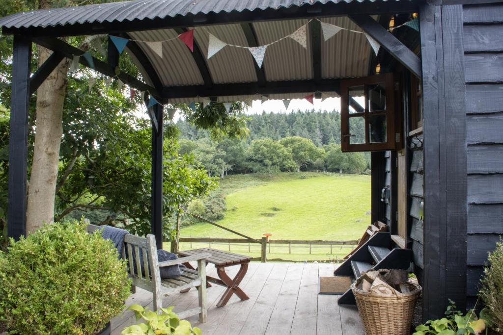 Zahrada ubytování The Woodmans Hut Minehead