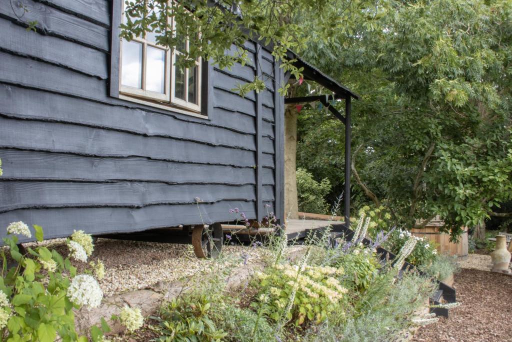 Zahrada ubytování The Woodmans Hut Minehead